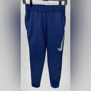 Nike Dri-Fit Therma boys navy blue athletic pants size L with zipper pocket.
